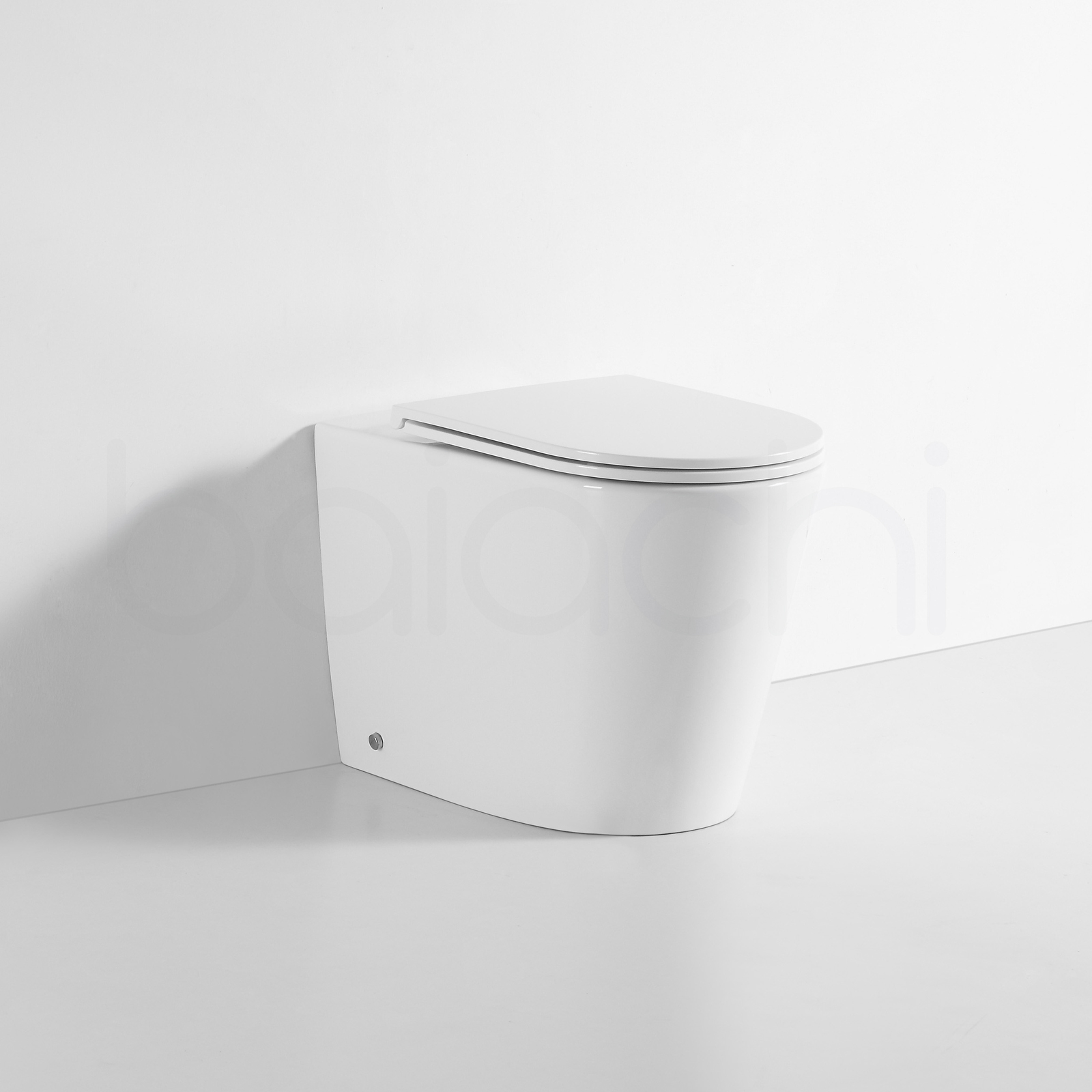 Ballina Rimless In Wall Toilet Suite with Round Stainless Steel Gun Metal Flushing Buttons